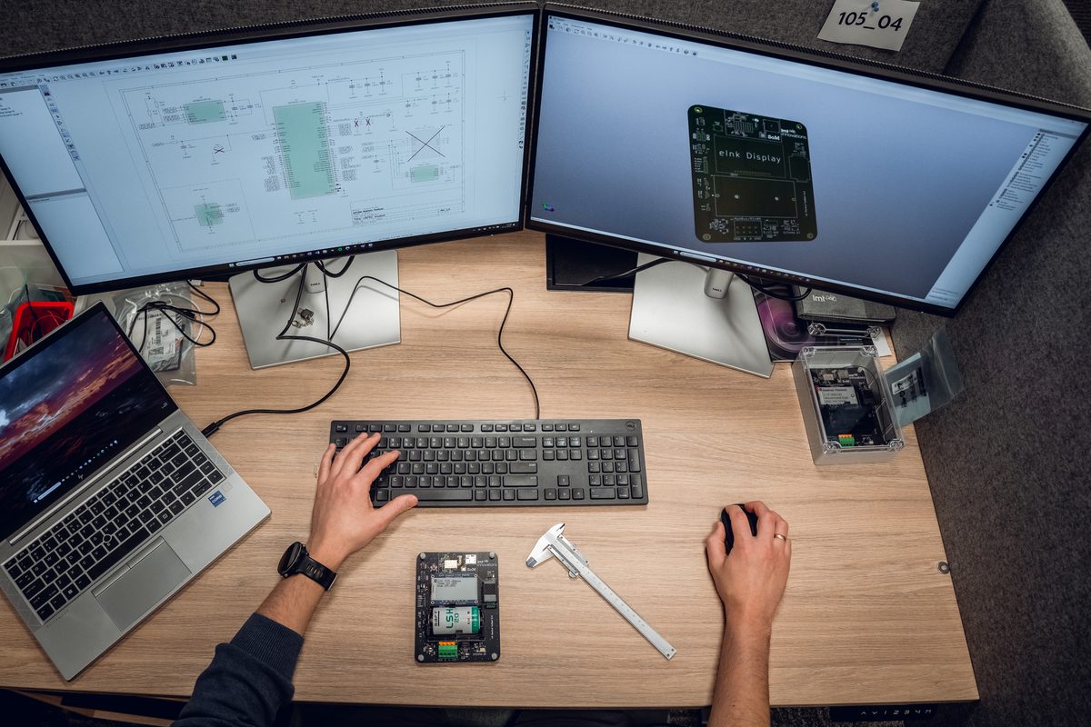 Hardware engineering workspace with PCB design and prototyping